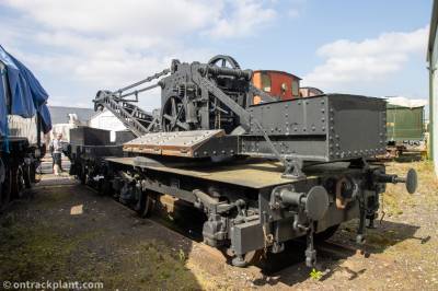 image showing a large yellow on-track machine