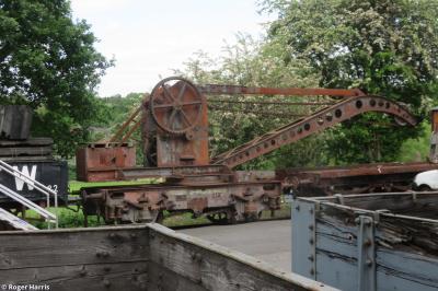 image showing a large yellow on-track machine