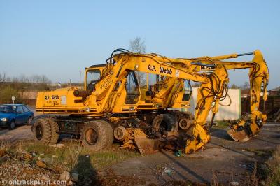 image showing a large yellow on-track machine