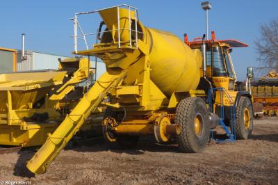 image showing a large yellow on-track machine