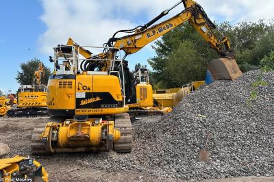 image showing a large yellow on-track machine