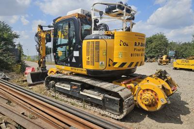 image showing a large yellow on-track machine