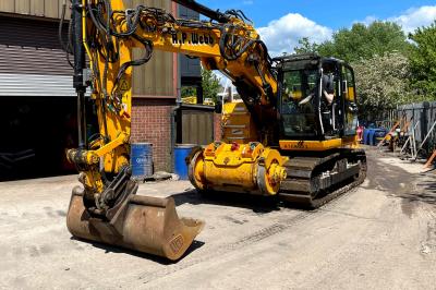 image showing a large yellow on-track machine