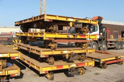 image showing a large yellow on-track machine