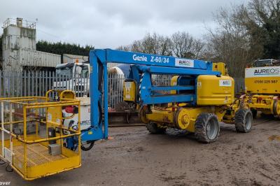 image showing a large yellow on-track machine
