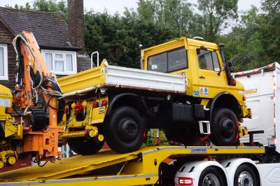 image showing a large yellow on-track machine