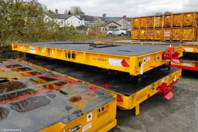 image showing a large yellow on-track machine
