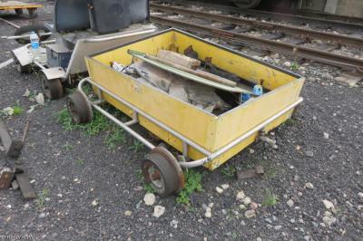image showing a large yellow on-track machine