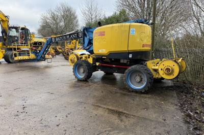 image showing a large yellow on-track machine