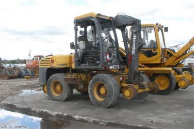 image showing a large yellow on-track machine
