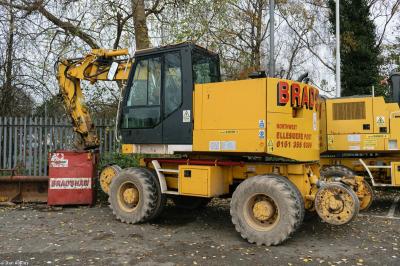 image showing a large yellow on-track machine