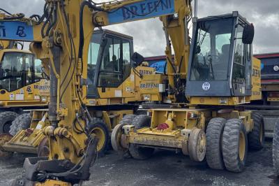 image showing a large yellow on-track machine