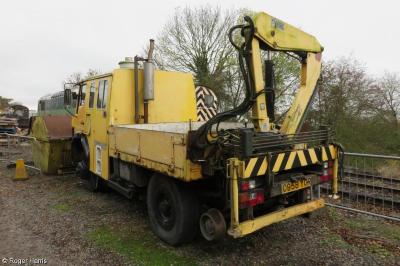 image showing a large yellow on-track machine