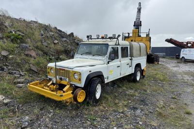 image showing a large yellow on-track machine
