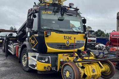 image showing a large yellow on-track machine