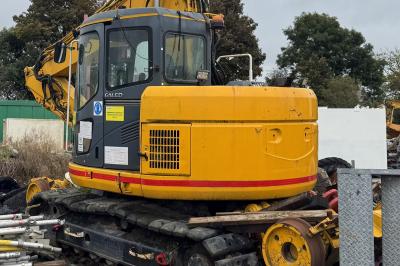 image showing a large yellow on-track machine