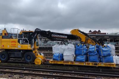 image showing a large yellow on-track machine