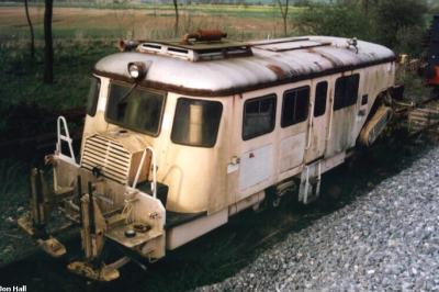image showing a large yellow on-track machine