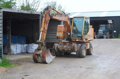 image showing a large yellow on-track machine