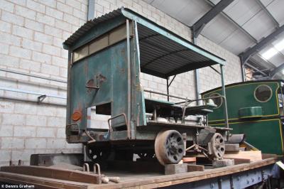 image showing a large yellow on-track machine