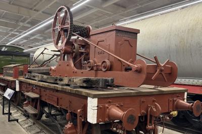 image showing a large yellow on-track machine