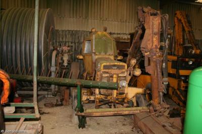 image showing a large yellow on-track machine