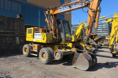 image showing a large yellow on-track machine