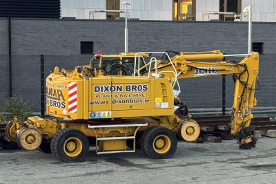 image showing a large yellow on-track machine