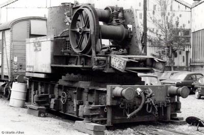 image showing a large yellow on-track machine