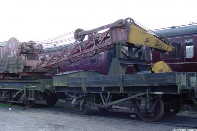 image showing a large yellow on-track machine