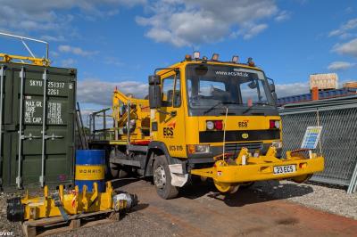 image showing a large yellow on-track machine