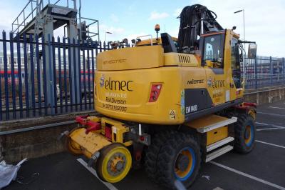 image showing a large yellow on-track machine