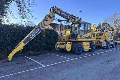 image showing a large yellow on-track machine