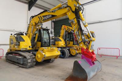 image showing a large yellow on-track machine