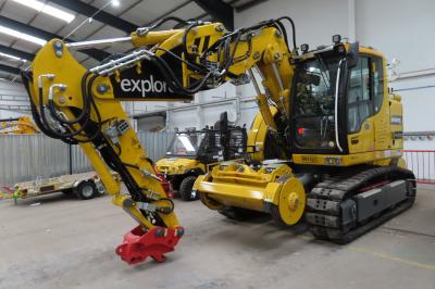 image showing a large yellow on-track machine