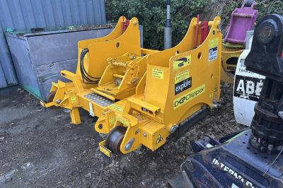 image showing a large yellow on-track machine