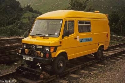 image showing a large yellow on-track machine