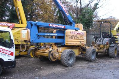image showing a large yellow on-track machine