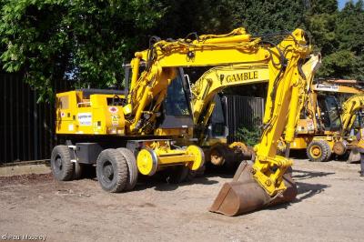 image showing a large yellow on-track machine