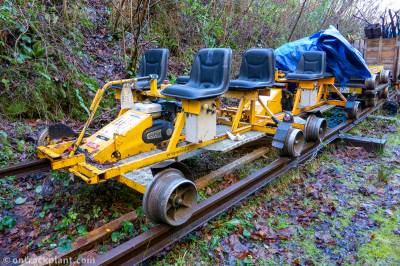 image showing a large yellow on-track machine