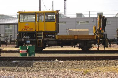 image showing a large yellow on-track machine