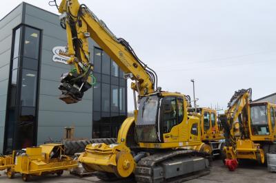 image showing a large yellow on-track machine
