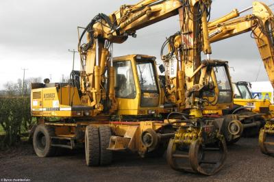 image showing a large yellow on-track machine