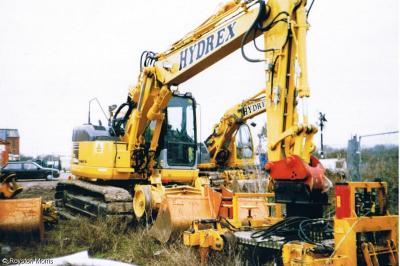 image showing a large yellow on-track machine
