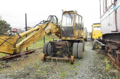 image showing a large yellow on-track machine
