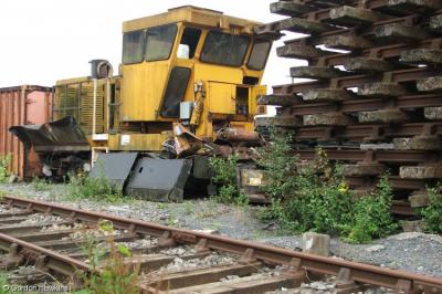 image showing a large yellow on-track machine