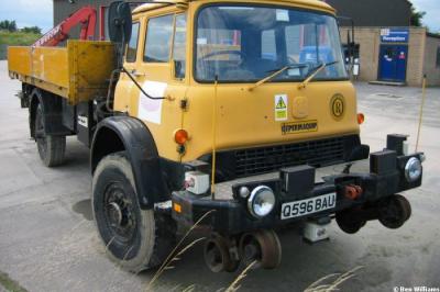 image showing a large yellow on-track machine