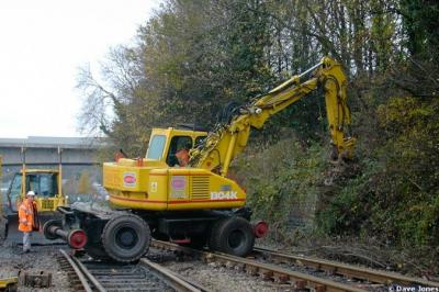 image showing a large yellow on-track machine