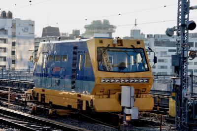 image showing a large yellow on-track machine