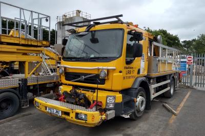 image showing a large yellow on-track machine